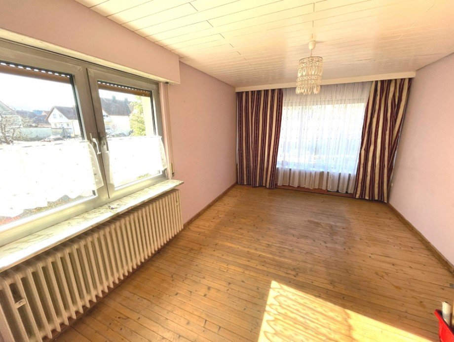 Wohnzimmer EG Mehrfamilienhaus Dielheim / Balzfeld