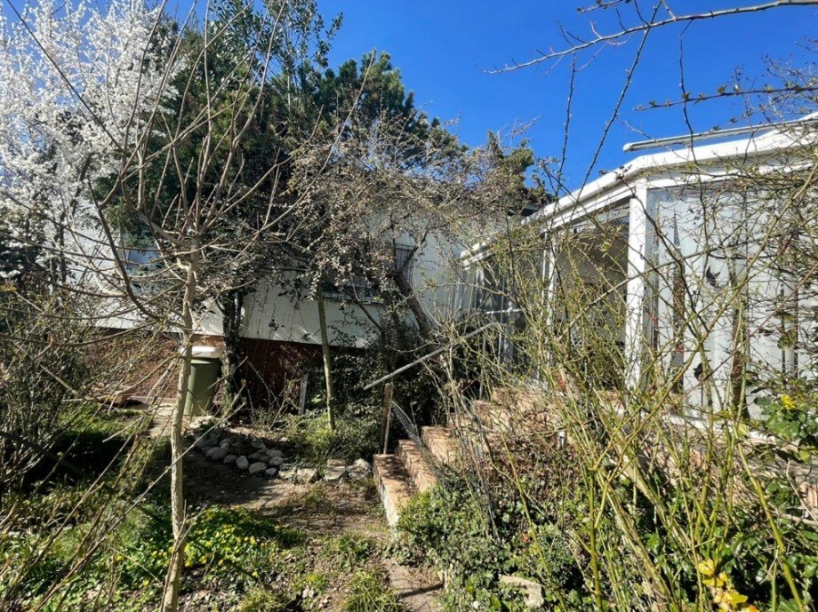 R�ckansicht mit Wintergarten Einfamilienhaus Sinsheim