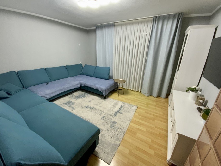 Wohnzimmer EG Mehrfamilienhaus Heidelberg / Ziegelhausen
