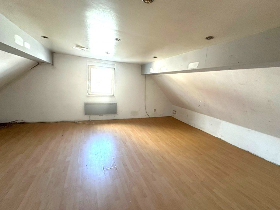 Wohnzimmer DG Mehrfamilienhaus Sinsheim