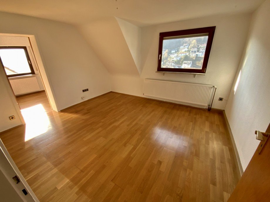 Wohnzimmer DG Mehrfamilienhaus Heidelberg / Ziegelhausen